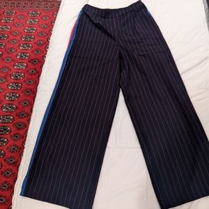 La Ligne X  Target collab wide leg side stripe pants.